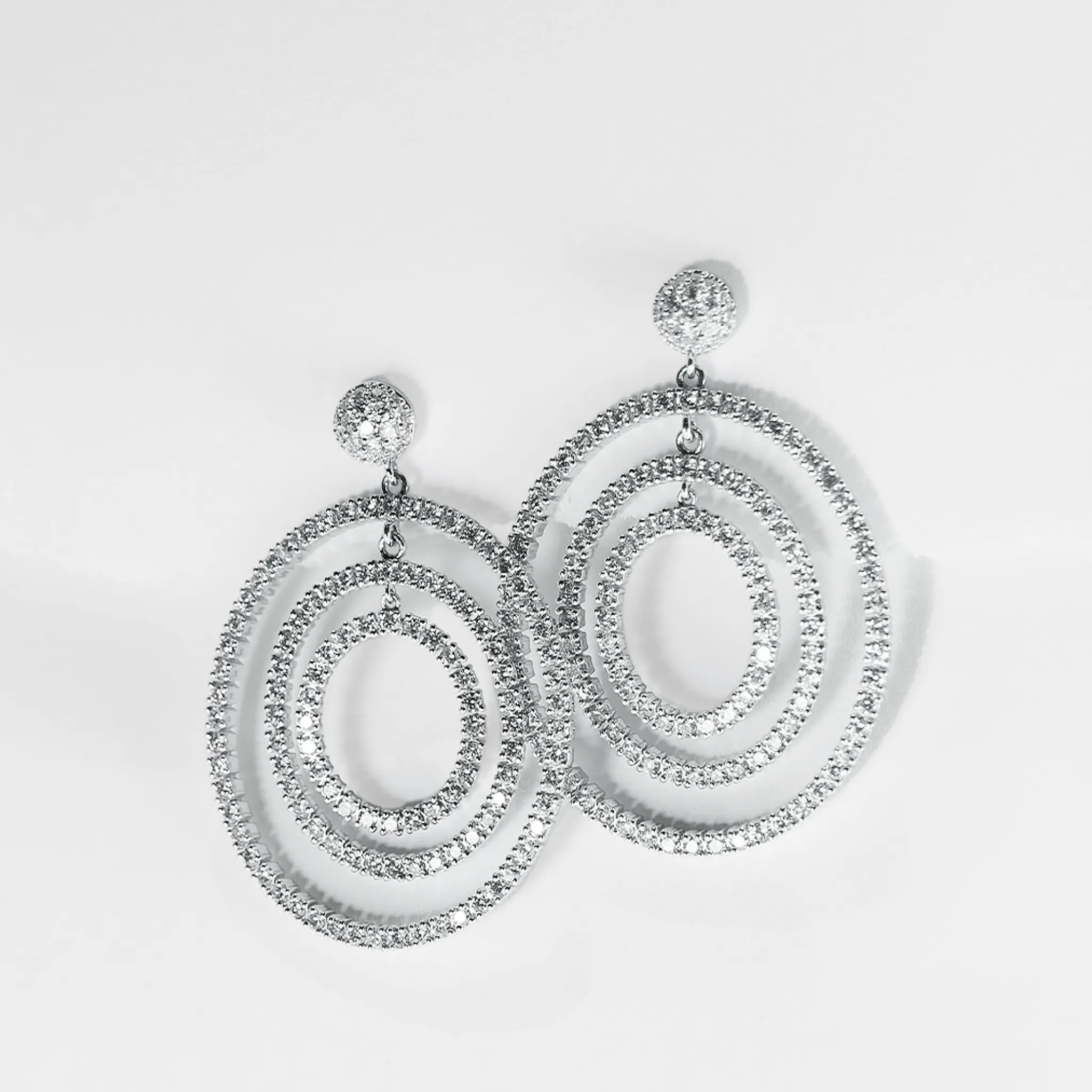 Oval Paved Floating Diamond Earrings 18kt