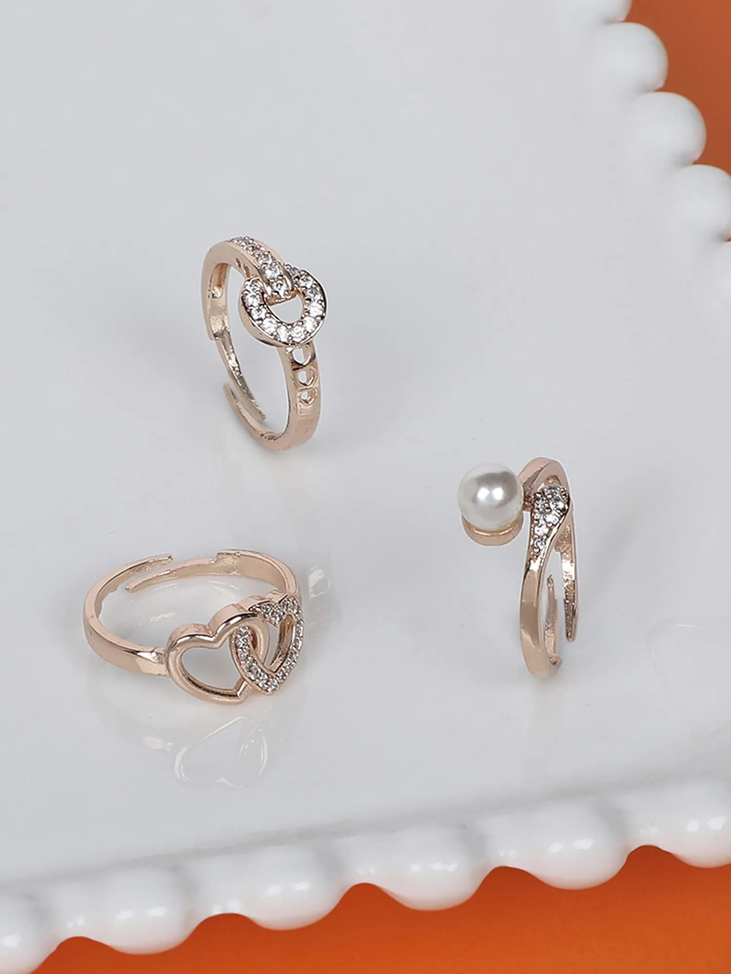 ZAVERI PEARLS Set of 3 Rose Gold Contemporary Cubic Zirconia Brass Adjustable Rings For Women-ZPFK11176